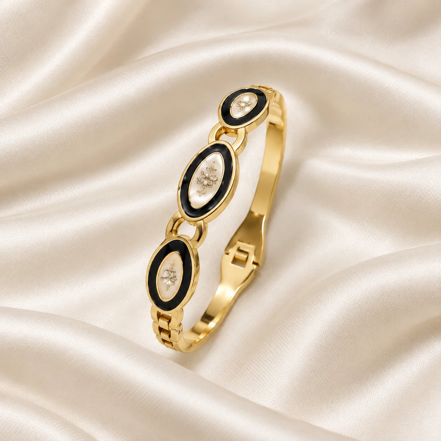 Noor Black Enamel Gold Bangle flatlay
