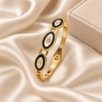 Noor Black Enamel Gold Bangle styled lifestyle