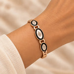 Noor Black Enamel Rose Gold Bangle square worn wrist close-up