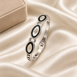 Noor Black Enamel Silver Bangle styled lifestyle