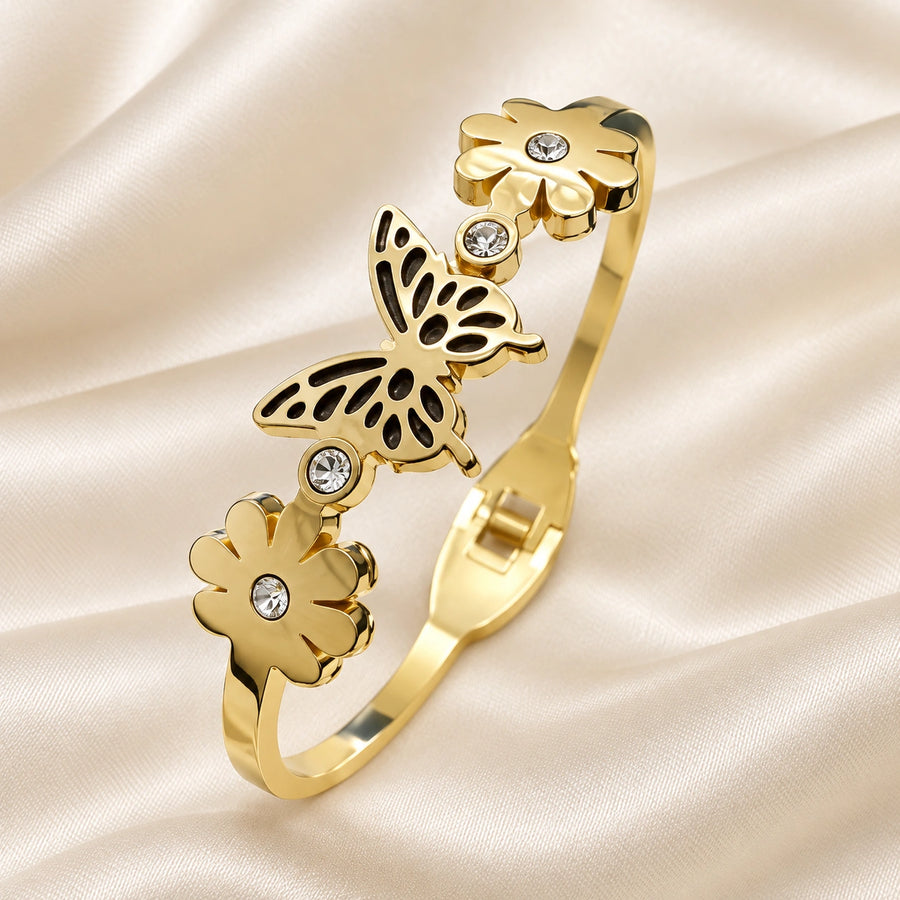 Aurelia Butterfly Bloom Gold Cuff Bangle square flatlay hero