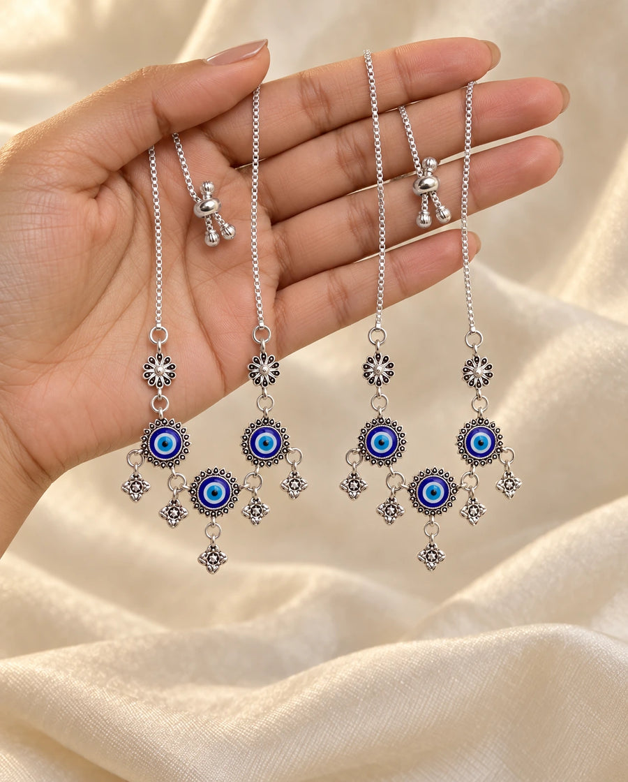 Trinetra Nazar Payal Pair presented in hand