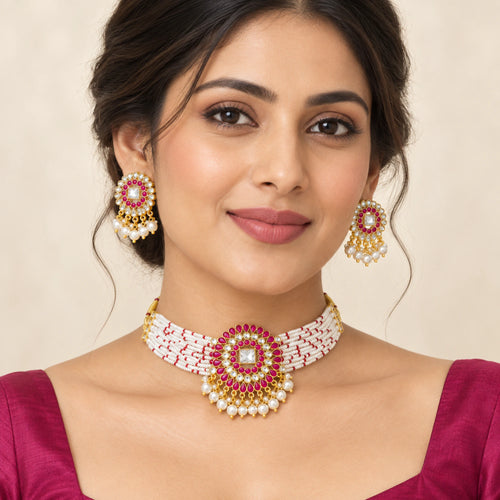 Magenta kundan pearl choker necklace and earrings set worn