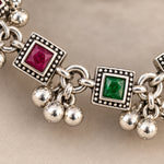Rangoli Ruby Emerald Silver Payal Pair — macro detail