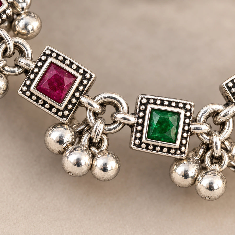 Rangoli Ruby Emerald Silver Payal Pair — macro detail