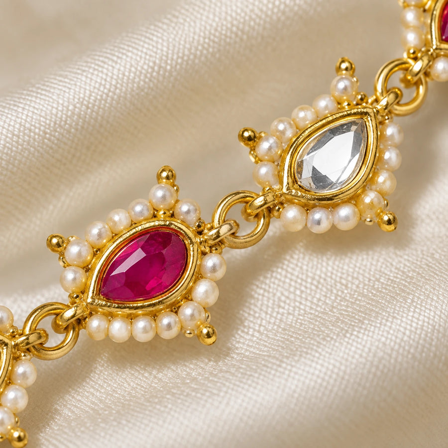 Roshni kundan stone and pearl macro detail